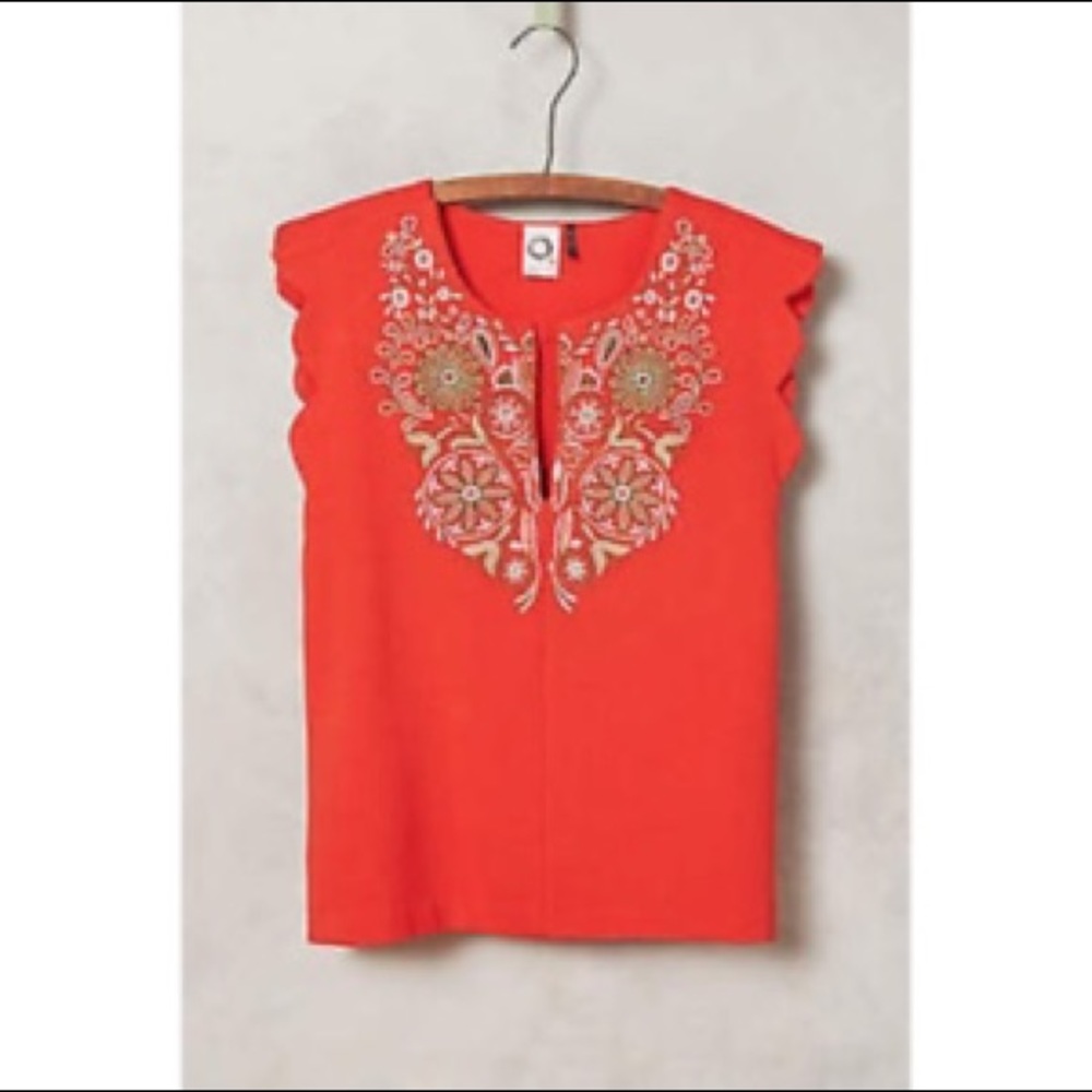Red top with embroidery and beading
